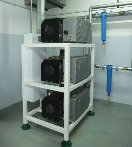 Elmo Rietschle Side Channel blowers stacked on the rack in a hospital facility for ventilators